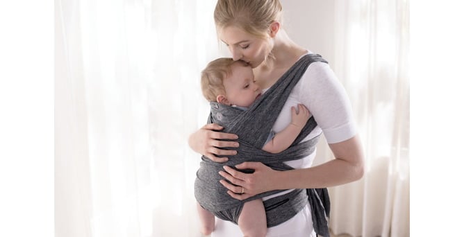 Baby wearing, a warm embrace that helps baby to grow